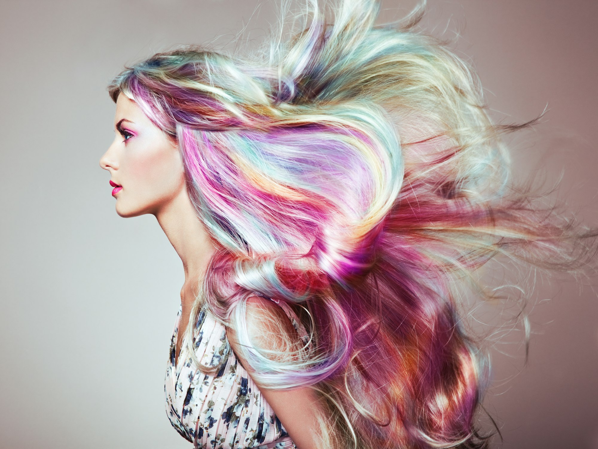 Beauty fashion model girl with colorful dyed hair