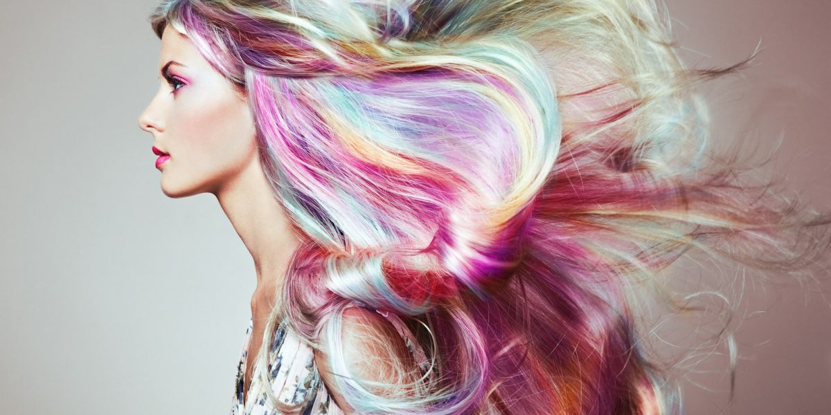 Beauty fashion model girl with colorful dyed hair